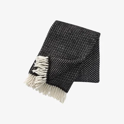 Nordic Nest Polka wool throw black