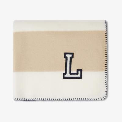 Nordic Nest Blid Striped Recycled Fleece blanket 130x170 cm Beige-white