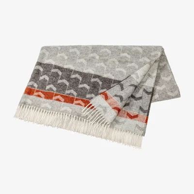 Nordic Nest Arrow wool throw rusty red