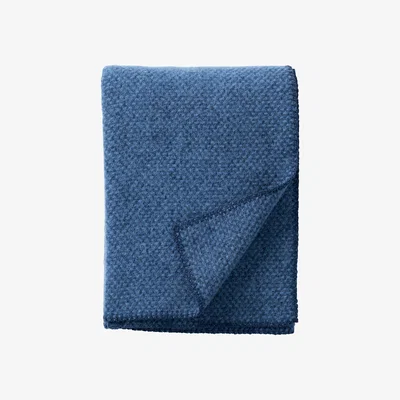 Nordic Nest Domino wool throw sea blue