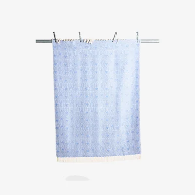 Oliver Bonas Niru Woven Blue Geometric Throw