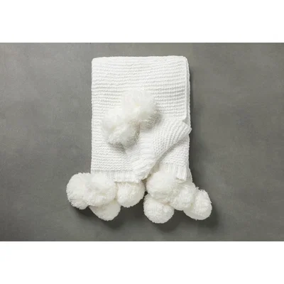 Perch and Parrow Gazelle Knitted Throw with Pom Poms in Cream