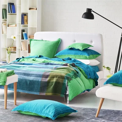 The Rug Seller Bampton Emerald Woven Throw in Emerald Green by Designers Guild