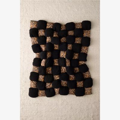 Urban Outfitters Leopard Sherpa Puff Throw ALL at Urban Outfitters