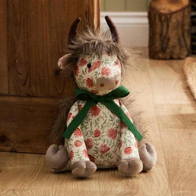 Dunelm Voyage Maison Hugo the Highland Cow Doorstop