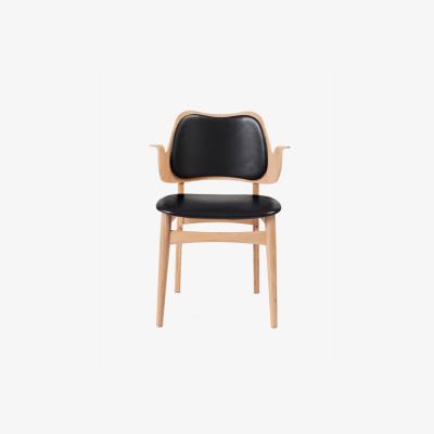 Nordic Nest Warm Nordic Gesture chair upholstered seat and back Leather prescott 207 black white oiled oak legs upholstered seat upholstered back