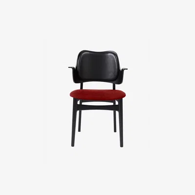 Nordic Nest Warm Nordic Gesture chair upholstered seat and back Fabric brick red leather backrest black lacquered beech legs