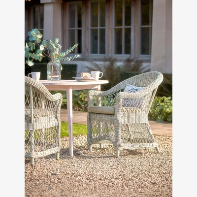 Cox and Cox Two Open Weave Dining Chairs