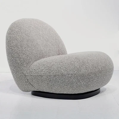 The Conran Shop Pacha Swivel Lounge Chair in Chestnut & Black