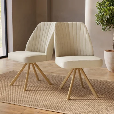 Furniture123 Set of 2 Beige Upholstered Swivel Dining Chairs with Oak Effect Legs - Logan