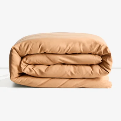 Kave Home Sirale 100% cotton sateen duvet cover with washed orange finish for 90cm bed