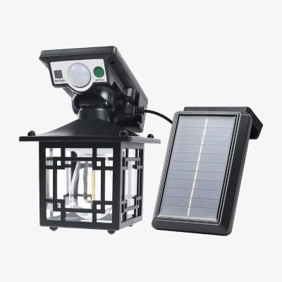 The Range 3W Adjustable LED Solar PIR Sensor Cylinder Wall Lantern Light - Black