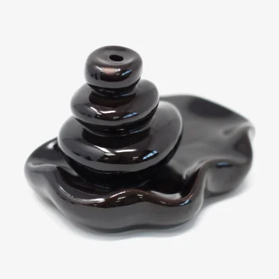 The Range Back Flow Incense Burner Large Pebbles into Pool - Black