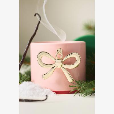 Anthropologie Bow Charm Woody Vanilla Bean & Balsam Ceramic Candle