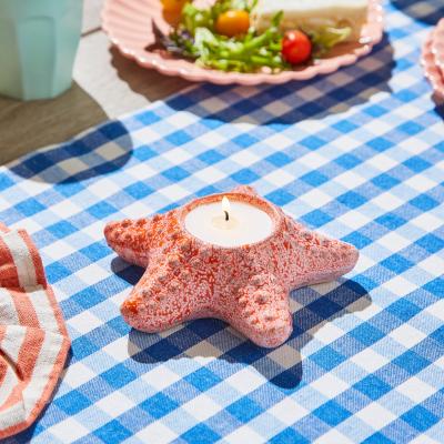 Dunelm Starfish Citronella Outdoor Candle