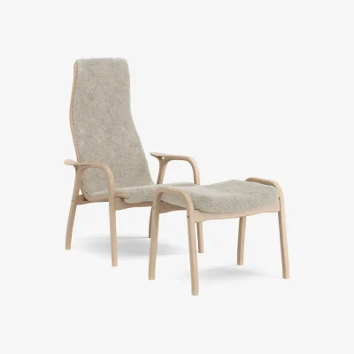 Nordic Nest Swedese Lamino armchair and footstool Sheepskin Moonlight-laquered beech