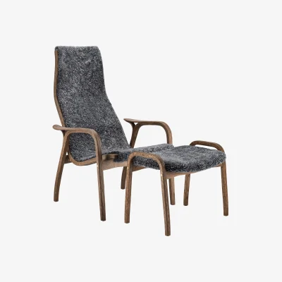Nordic Nest Swedese Lamino armchair and footstool Sheepskin Charcoal-Rubio Monocoat Chocolate