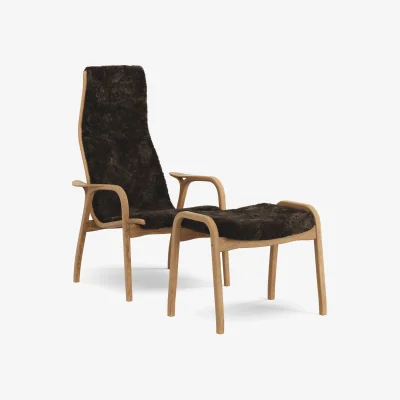 Nordic Nest Swedese Lamino armchair and footstool Sheepskin Espresso-oiled oak