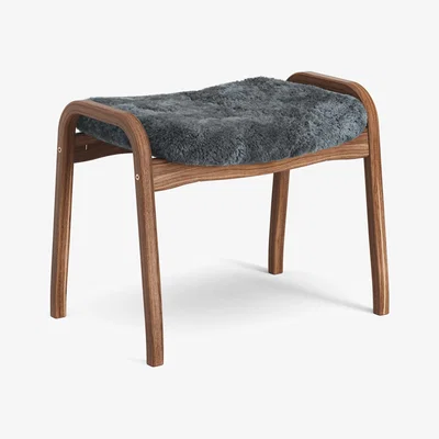 Nordic Nest Swedese Lamino footstool Sheepskin Charcoal-lacquered walnut