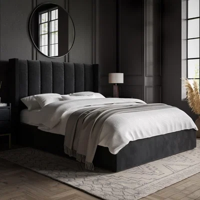 Furniture123 Black Velvet King Size Ottoman Bed With Winged Headboard - Maddox
