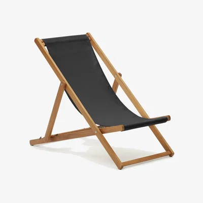 Kave Home Adredna folding outdoor deck chair in black with solid acacia wood FSC 100%