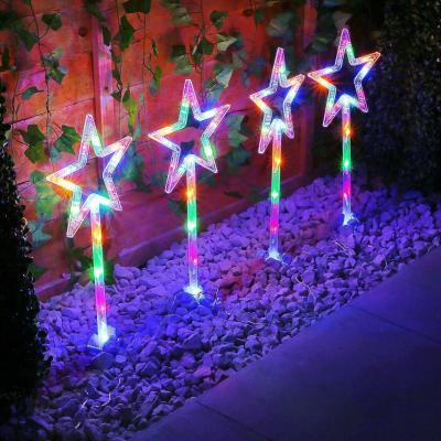 The Range 4pc Multicoloured Star Stake Lights - White