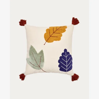 Kave Home Zelda white cushion cover with multicolour embroidered leaves and terracotta tassels, 45 x 45 cm