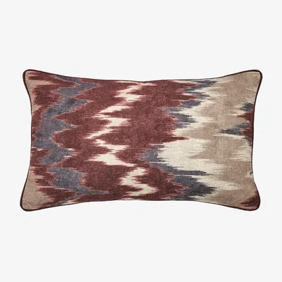 The Rug Seller Aris Ikat Bolster Cushion by Bedeck of Belfast in Mulberry Red60x40cm