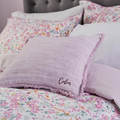 The Rug Seller Calm Textured Fringed Cushion By Katie Piper in Pink Lilac