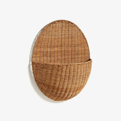 Kave Home Waira ratan hanging wall basket with a natural finish