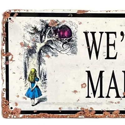 The Range Vintage Metal Sign - Alice In Wonderland - We're All Mad Here - White