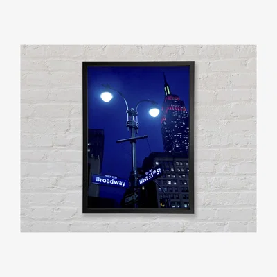 The Range Empire State Building Lights Framed Print Architecture Prints - Black