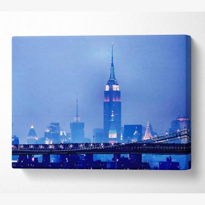 The Range Empire State Building Blue Night Canvas Print Wall Art - Yellow / 81.28cm