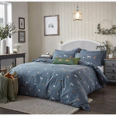 The Rug Seller Christmas Dogs Bedding in Midnight Blue By Sophie Allport