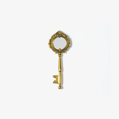 Perch and Parrow Maxine Antique Style Key Shape Hand Mirror in Brass