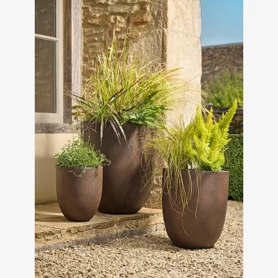 Cox and Cox Three Rust Effect Tapered Planters