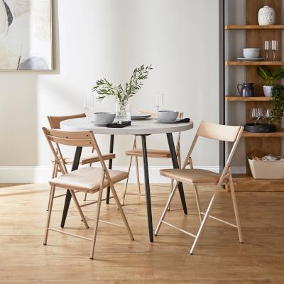Dunelm Zuri Round Dining Table with Emily Mink Velvet Folding Dining Chairs