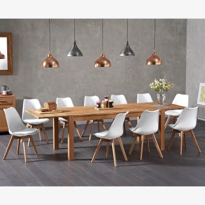 Oak&More Extending Thetford 180cm Solid Oak Dining Table With 6 White Orson Faux Leather Chairs