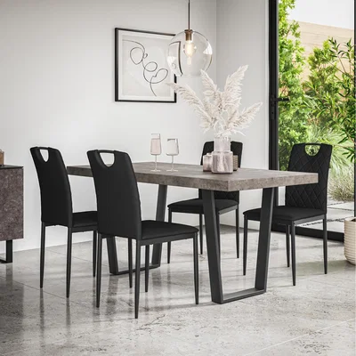 The Range Aria Dining Table And Chairs - Concrete Effect w 4-6 Monza Faux Leather Chair - Black / 6