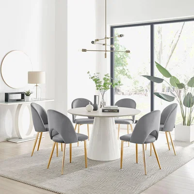 The Range Palma Beige Stone Effect Round Dining Table and 6 Arlon Gold Leg Chairs - Grey
