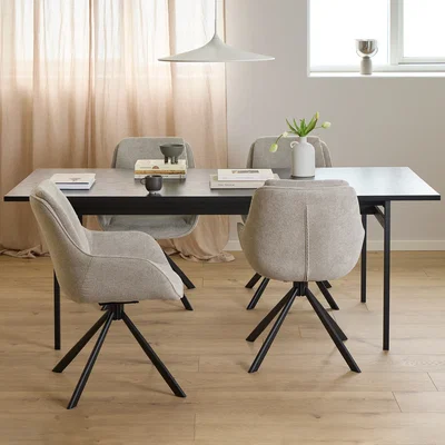The Range Angus Dining Table in Black 200x90cm includes 4 Carrie Swivel Dining Chairs in Sand - Black