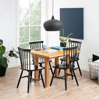 The Range Kenley Extending Dining Table in Oak 45-90cm includes 4 Riano Dining Chairs in Black - Oak & Black