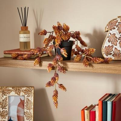 Dunelm Artificial Trailing Pinecones in Black Plant Pot