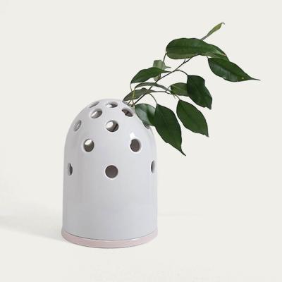 Bombinate.com Fly’s Eye Small Vase with Pink Water Container
