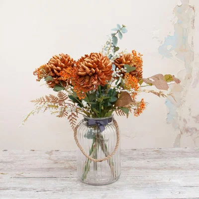 The Range Chrysanthemum, Achillea, Berries, Fern  Foliage in a Rope Lantern Vase by Peony - Autumnal oranges and russets with green leaves