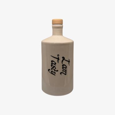 Wolf & Badger White / Black Artisan Crafted Ceramic I'm Tasty Bottles And Vase | Black and Wild