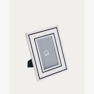 Kave Home Vittoria photo frame in black and white marble 23 x 18 cm