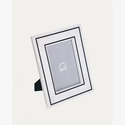 Kave Home Vittoria photo frame in black and white marble 25 x 20 cm