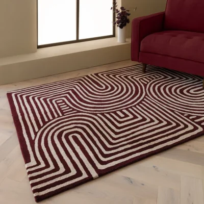 Dunelm Asiatic Reef Curve Plum Wool Rug