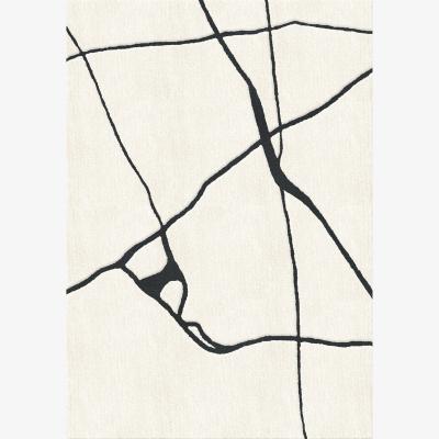 Nordic Nest Layered Gute wool rug Black and white 180x270 cm